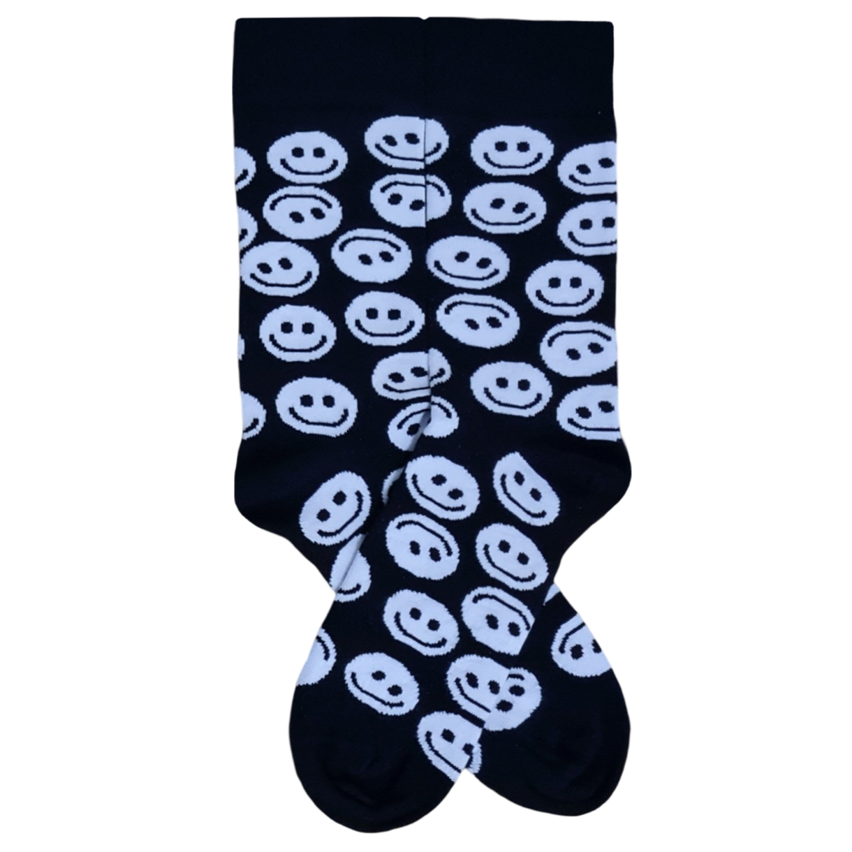 A pair of black socks with white smiley face designs.