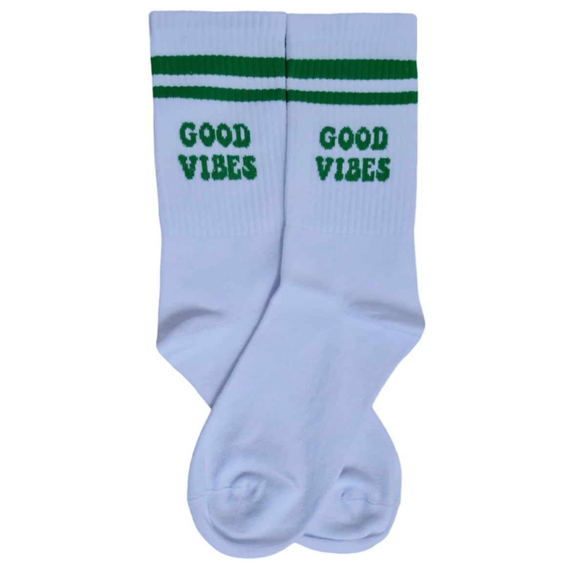 A pair of white socks with the text 'GOOD VIBES' and two green lines on the side.