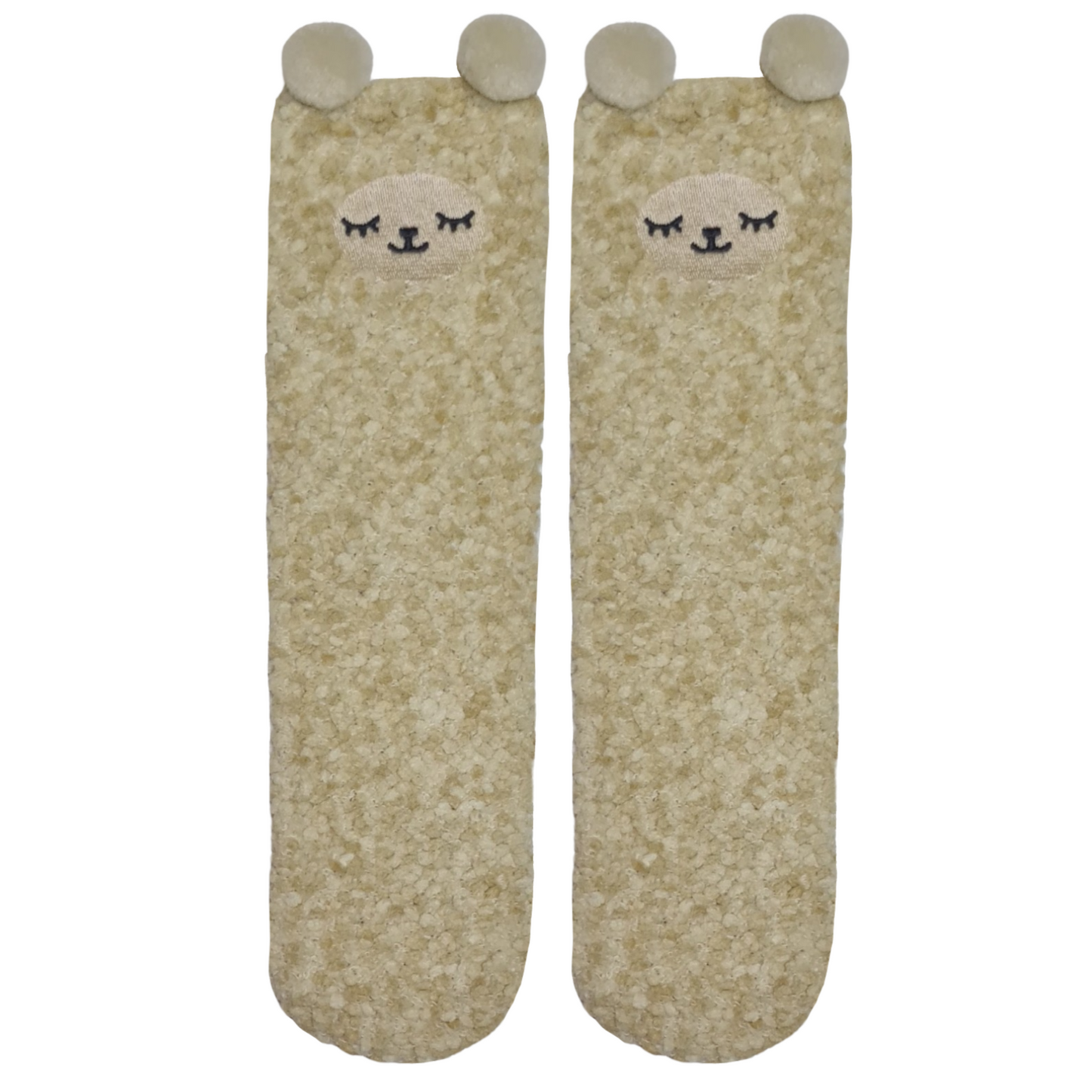 A pair of beige fluffy socks with cartoon llamfaces and ears on the top.a