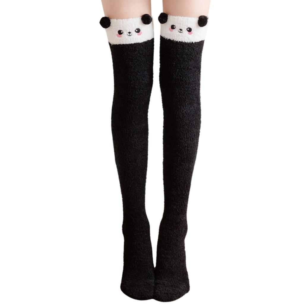 Black knee-high socks with panda face design on a white background