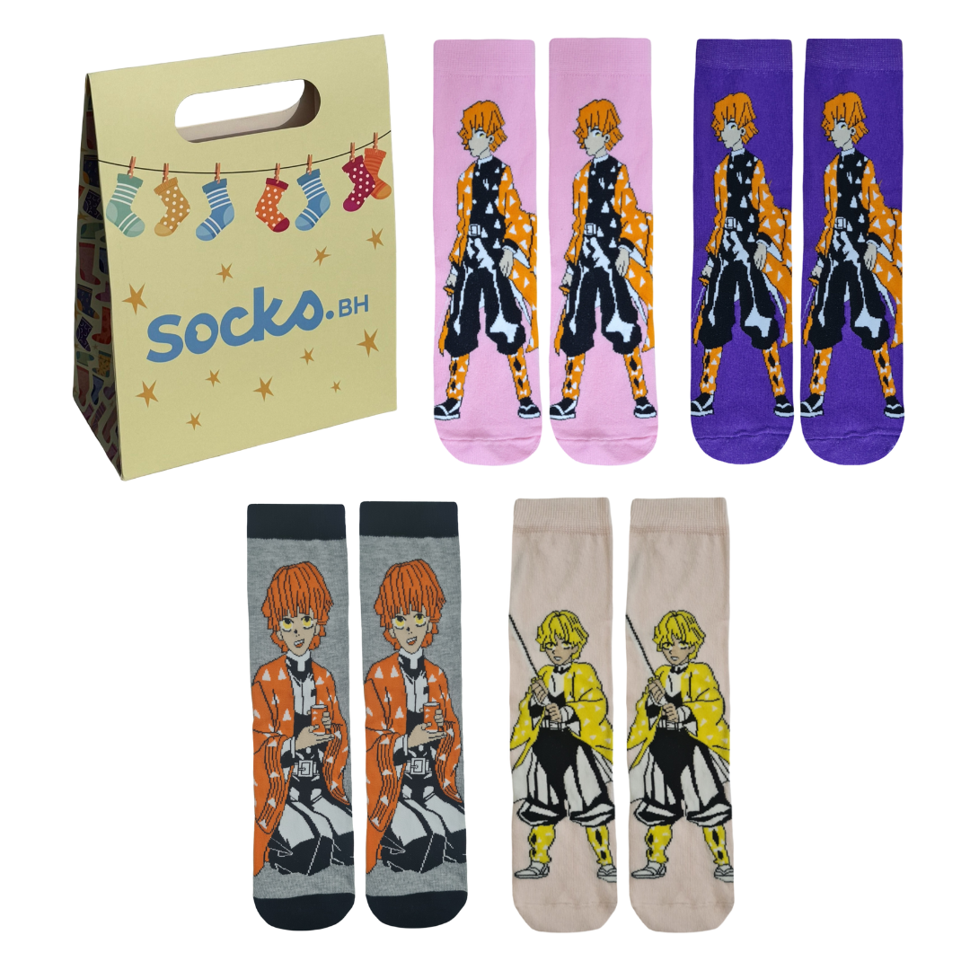 Four pairs of anime socks featuring Zenitsu Agatsuma from Demon Slayer next to a Socko.BH gift bag.
