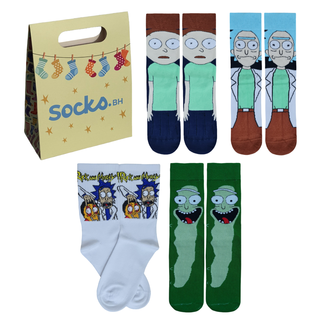 Four pairs of Rick and Morty themed crew socks next to a yellow Socko.BH gift bag, featuring designs of Morty Smith, Rick Sanchez, a white graphic pattern, and Pickle Rick.