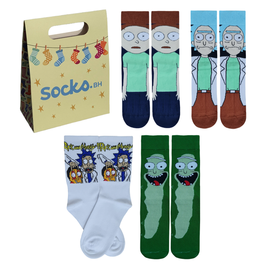 Four pairs of Rick and Morty themed crew socks next to a yellow Socko.BH gift bag, featuring designs of Morty Smith, Rick Sanchez, a white graphic pattern, and Pickle Rick.