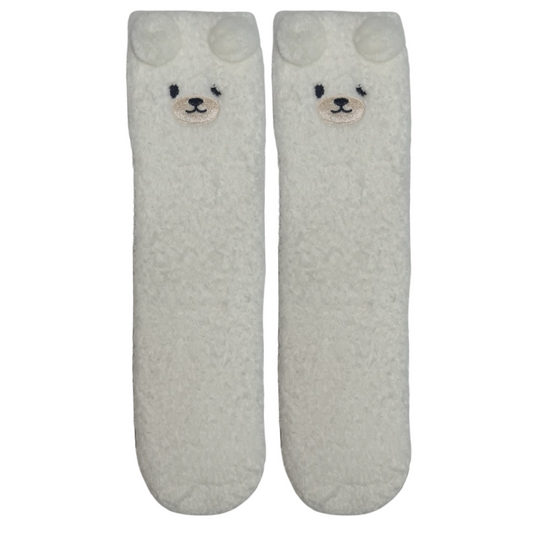Pair of light gray socks with dog face design on a white background