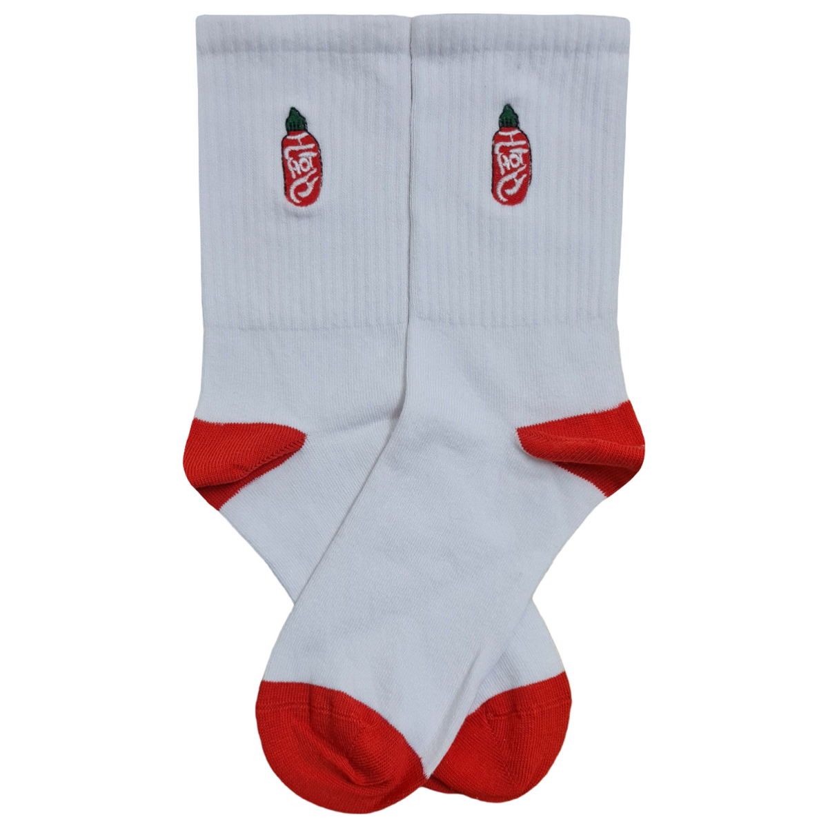 White mid-calf crew socks featuring red embroidered hot sauce bottles, red heels, and red toe caps.