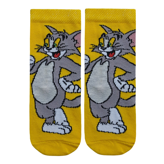 Yellow kids' crew socks featuring a large knitted graphic of Tom Cat from Tom and Jerry.