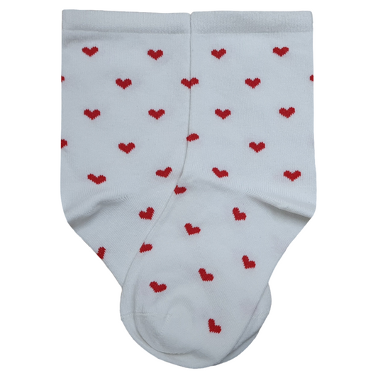 Pair of folded white kids ankle socks featuring an all-over repeating pattern of small red knit hearts.