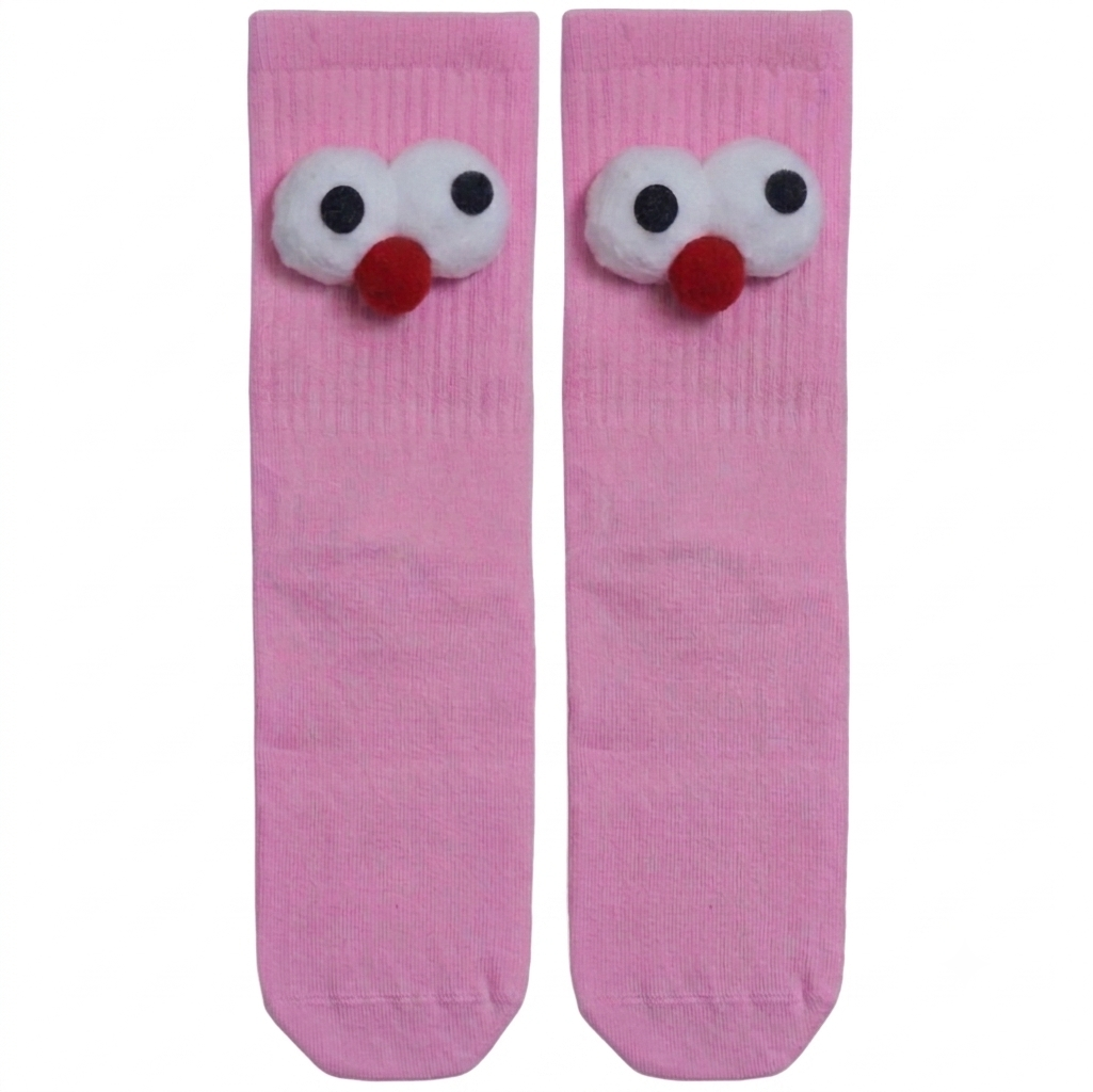 A pair of light pink mid-calf tube socks featuring cute 3D plush cartoon eyes and a round red pom-pom nose on the upper ribbing.