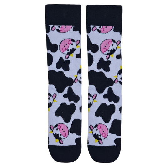 A pair of socks with a pattern of cartoon cows in black and white colors