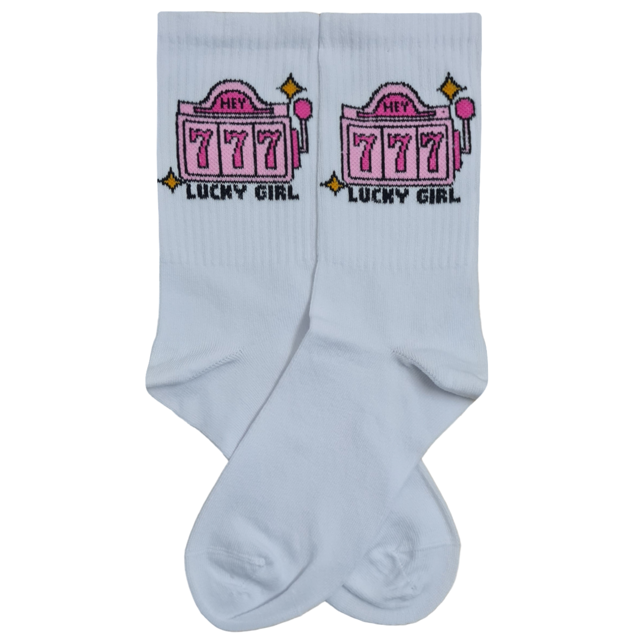 A pair of white mid-calf ribbed crew socks featuring a graphic design of a pink slot machine displaying three sevens "777" with the words "HEY" written above it and "LUCKY GIRL" written in black pixelated font below it.